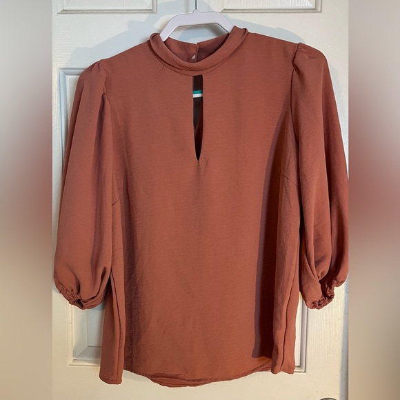 Misia brand top. Color is close to salmon. Worn once. Long sleeve. 100%poly - Picture 1 of 4